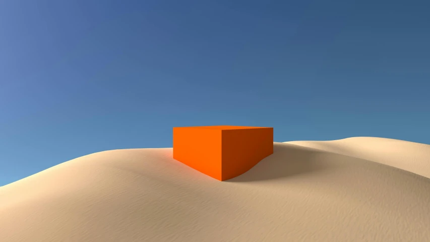 a orange object is sitting on the top of the desert