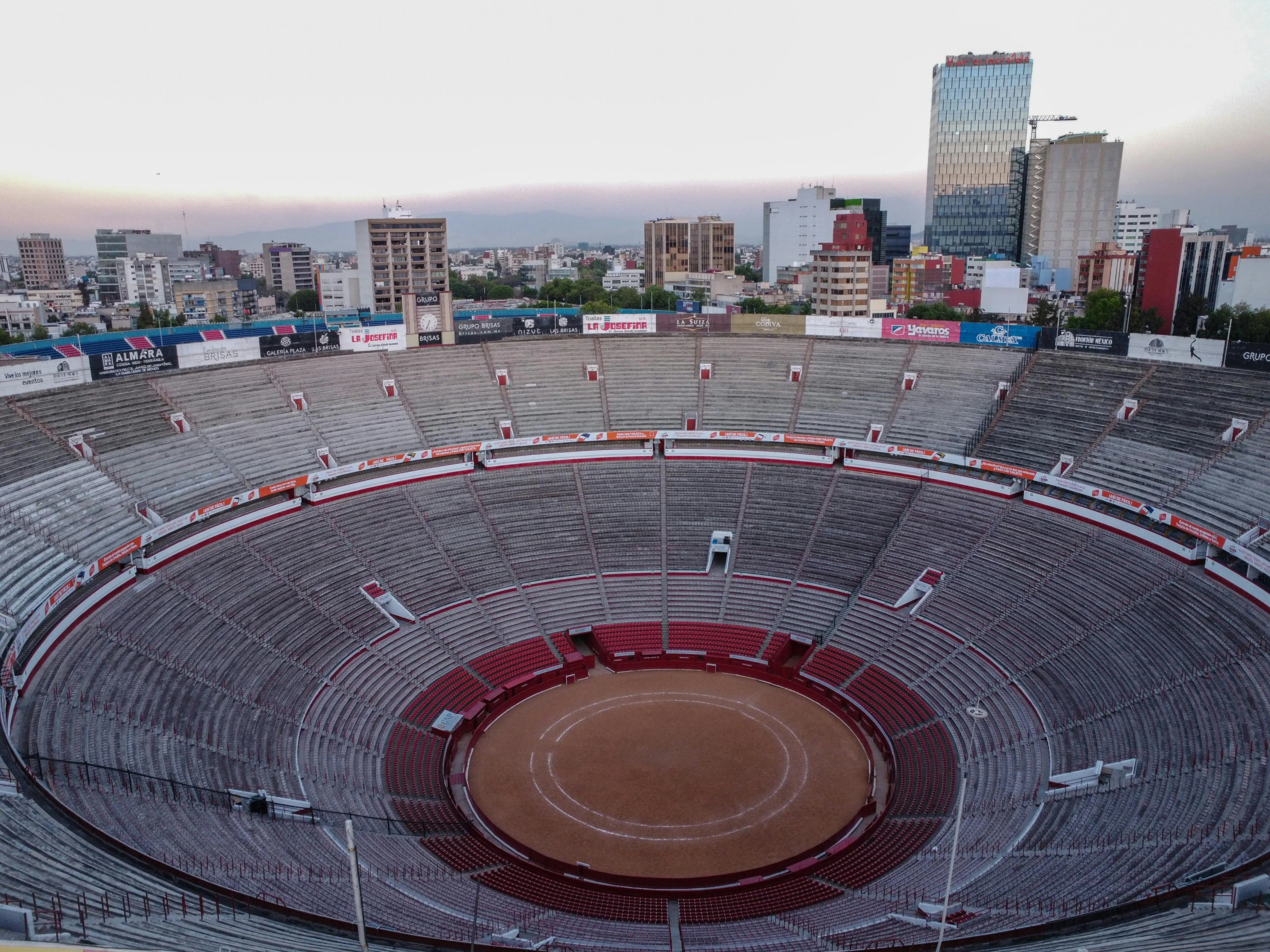 an aerial view of a large stadium and empty seats