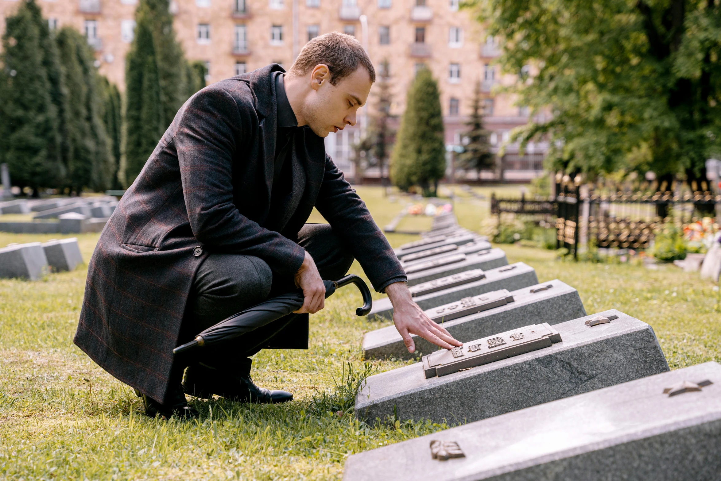 a man placing candy in a large grey box