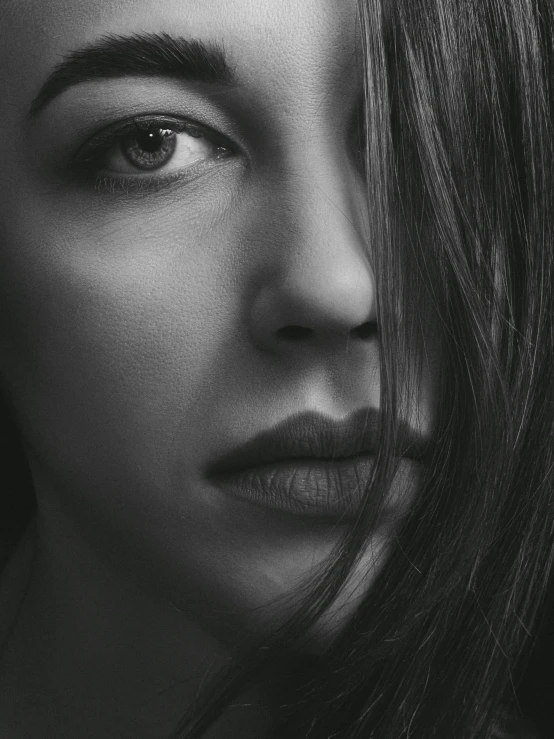 a close up of a woman with long hair