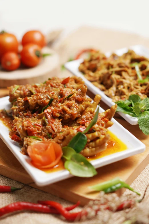 a variety of foods displayed in serving dishes