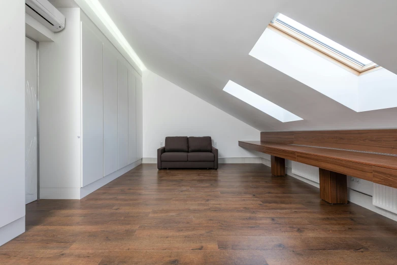 a living room with wooden floors and no furniture