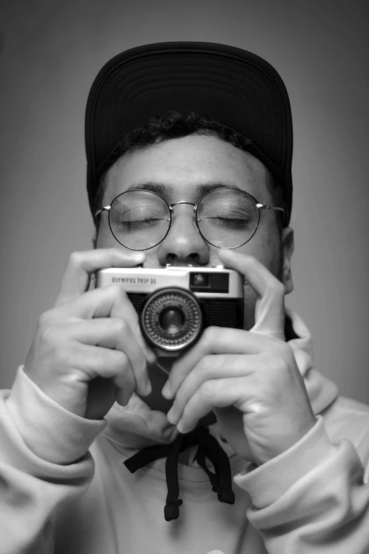 a man takes a selfie with his camera