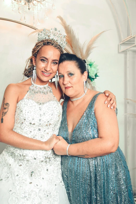 a couple of women posing together for a picture