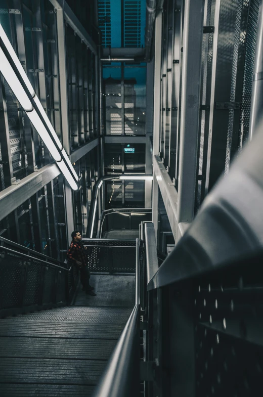 a person that is sitting down some stairs