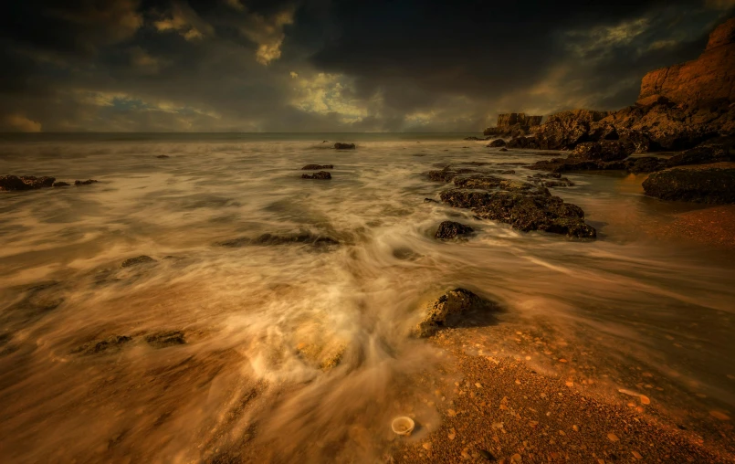 the sky and the ocean on a stormy day