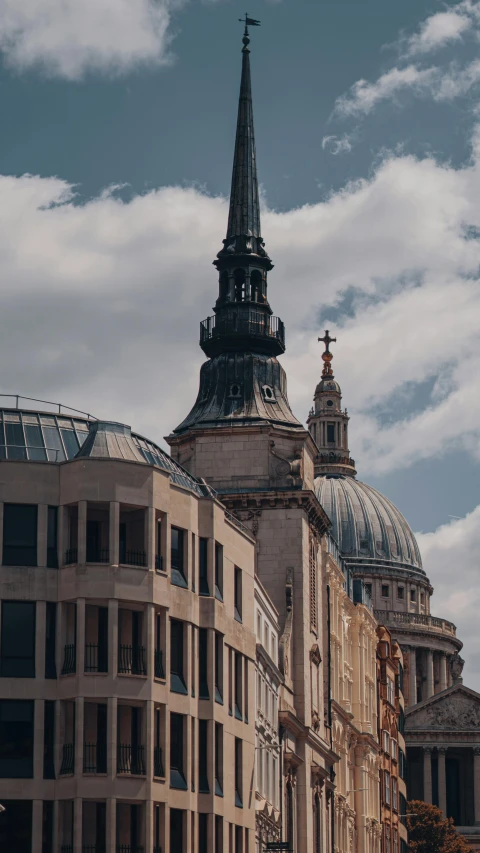 a picture of buildings with a tower and a dome in the middle