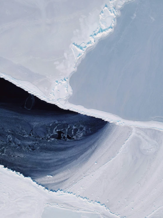 an aerial po of an open expanse of snow