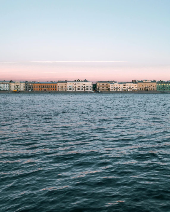 the skyline of the city across from water