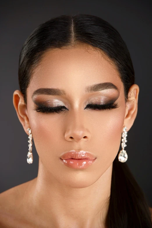 a woman with makeup and pearls on her face