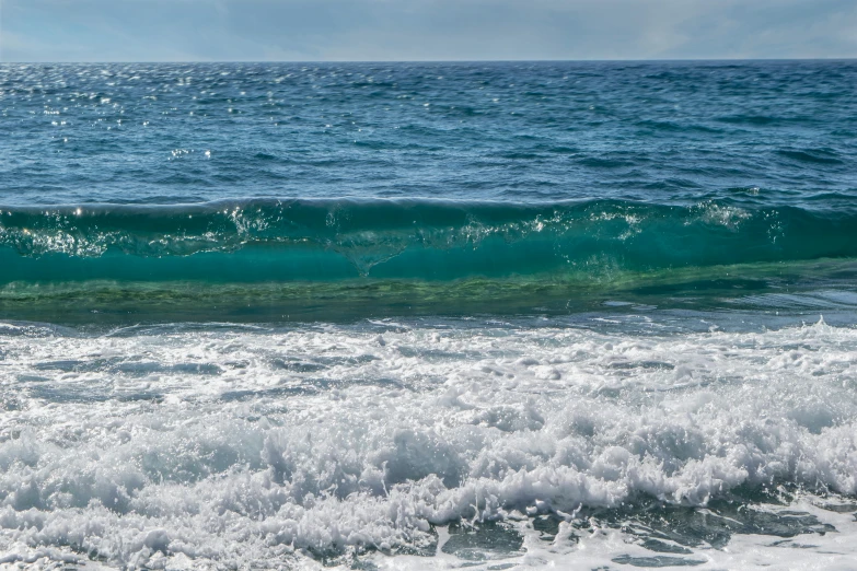 a large ocean waves that have been hitting the shore