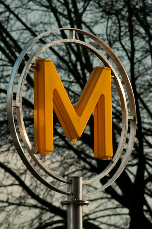 a picture of a large letter m in the middle of an object