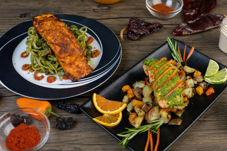 two plates with different foods next to each other