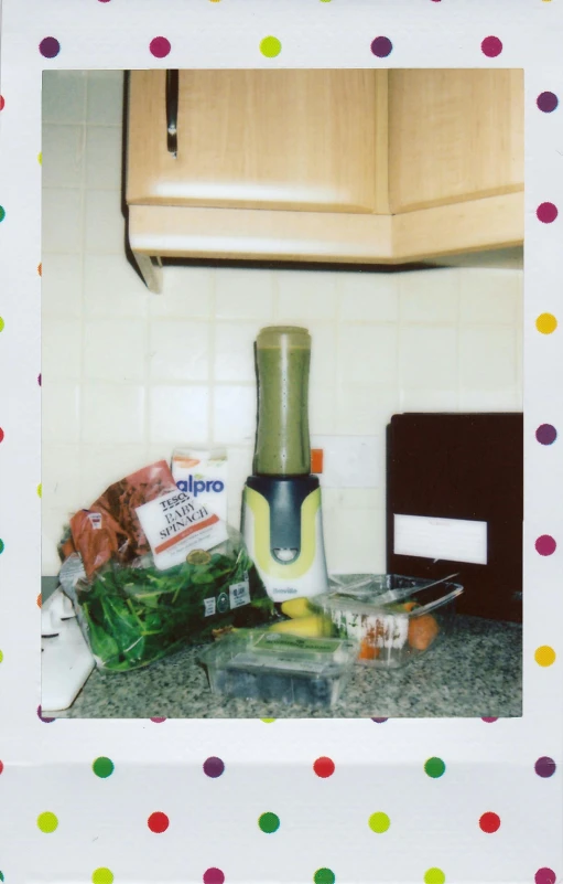 a kitchen counter with some stuff on it