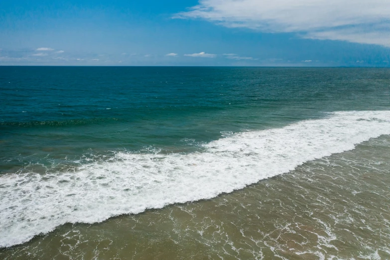 a very nice s of some water by the beach