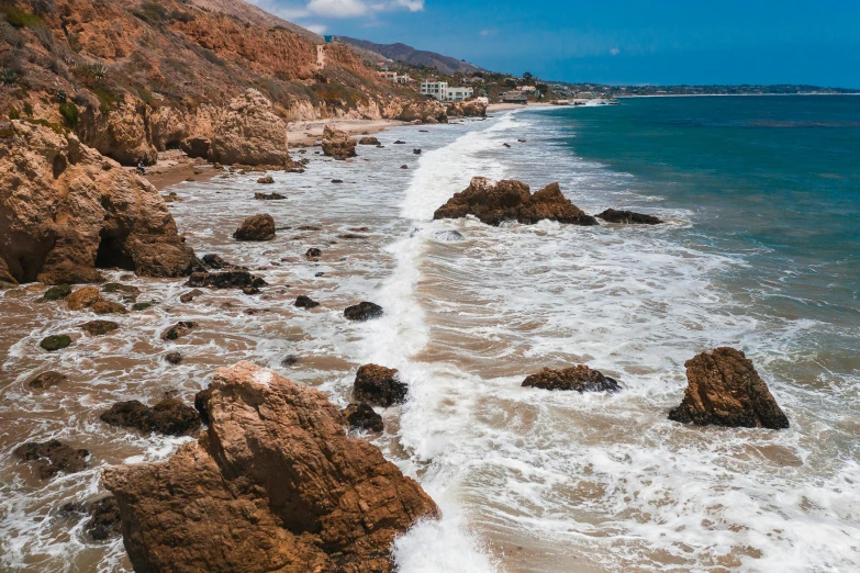 the view down the coast near a large body of water