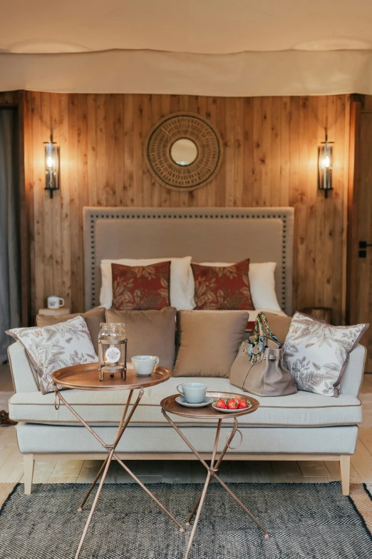 a fancy el bed in a room with wooden walls