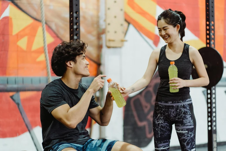 a man and a woman eating fruit together