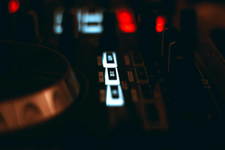 three illuminated keys sitting on the keyboard of a computer