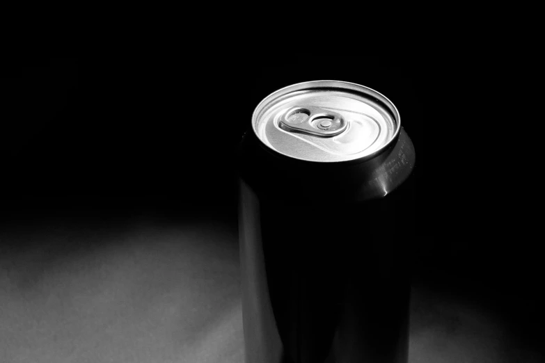 a can is on a black and white background