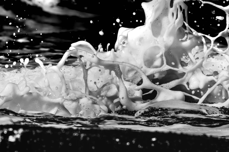 a pograph of the inside of a container that has bubbles coming out