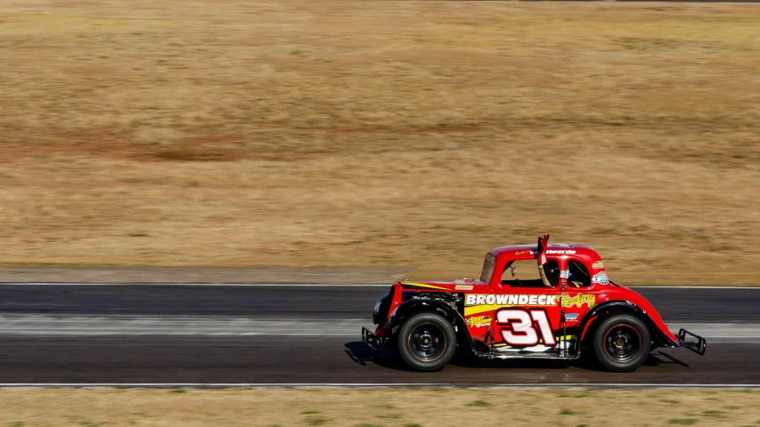 a racing car making its way down the road