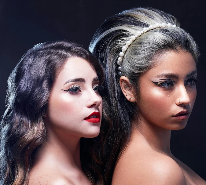 two models of different skin types with dark hair and one without