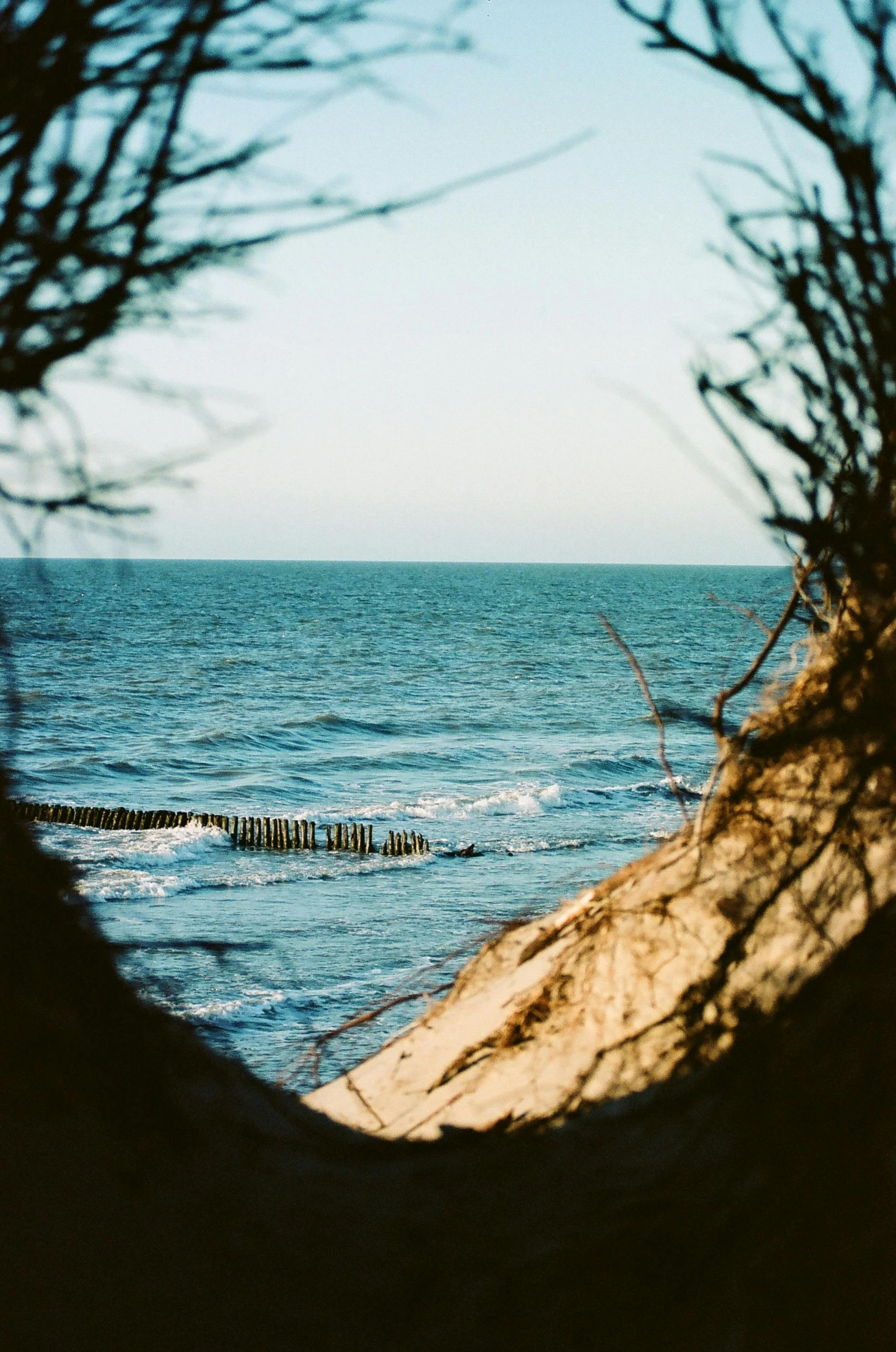 the water is dark and blue with a small wave