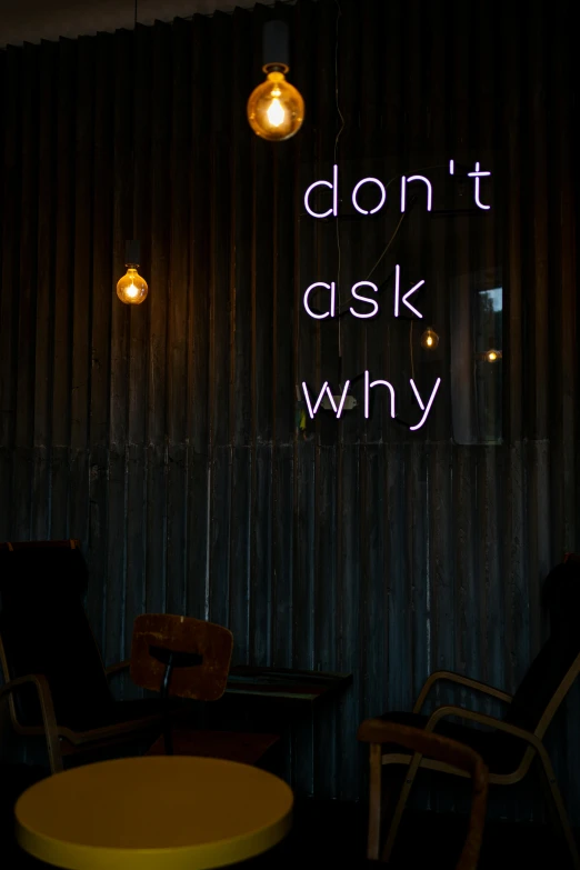 a dark and lonely room with chairs