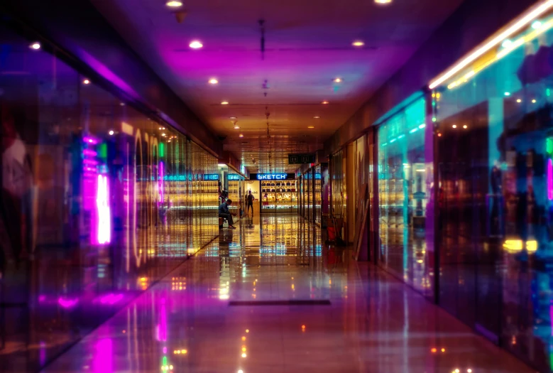 the interior of an illuminated office building is brightly lit