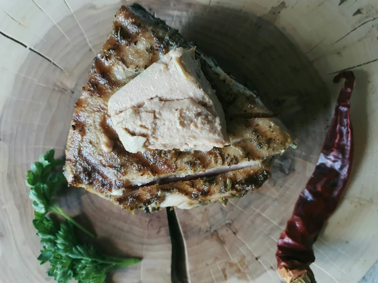 a piece of food sitting on top of a white plate