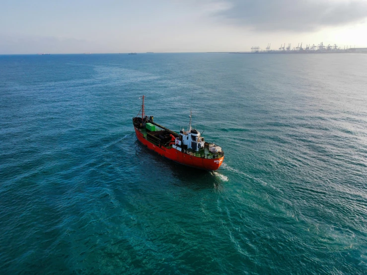 a boat floating in the middle of water