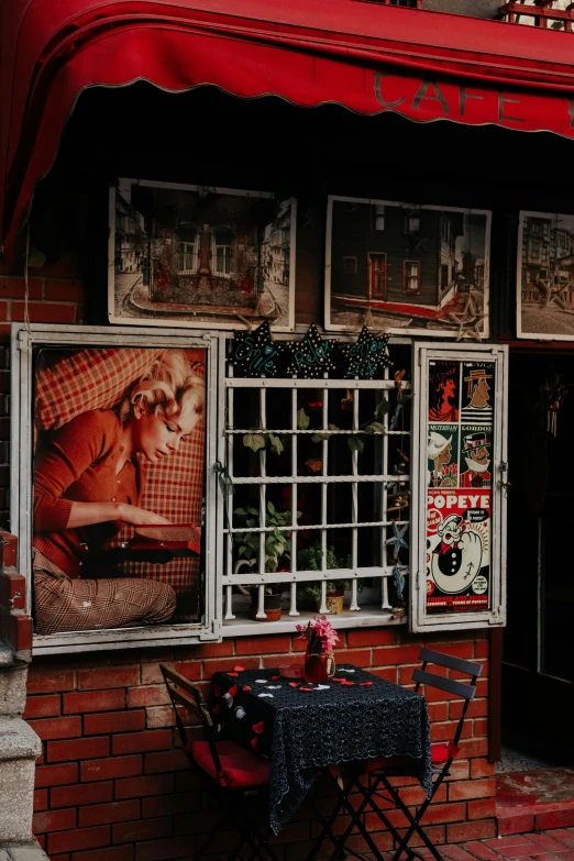 a window display on a red brick building