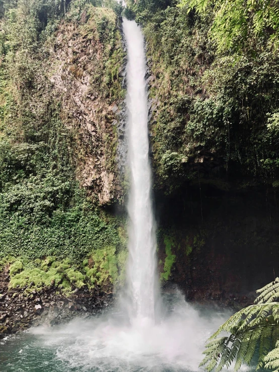 a small waterfall with a bunch of water coming from it