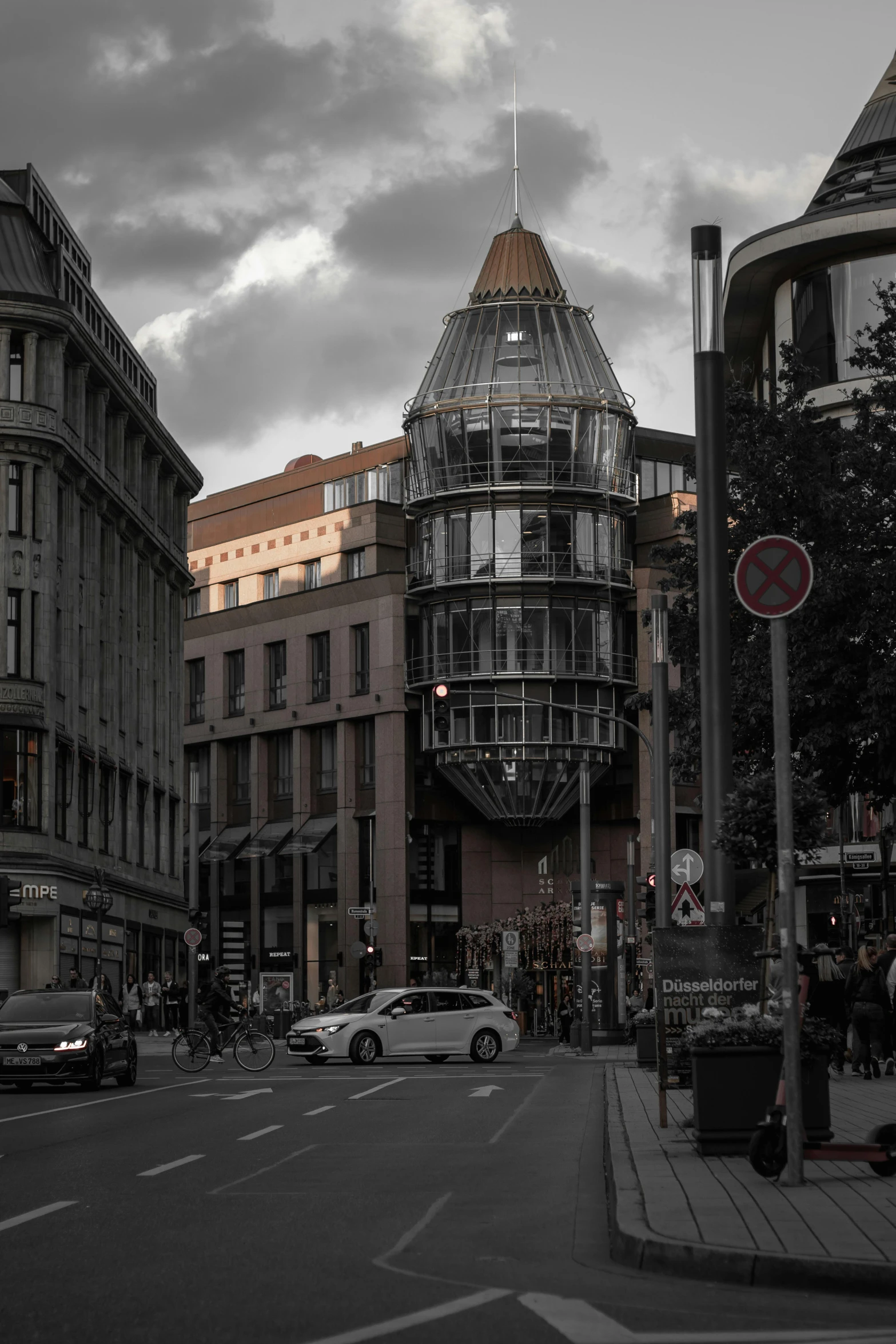 a road lined with lots of tall buildings