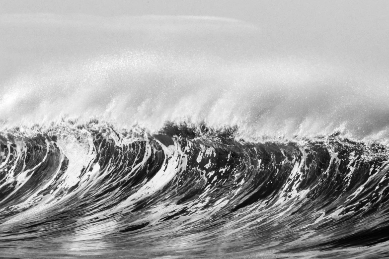 a black and white po of some rough waves