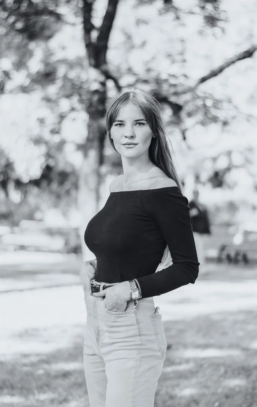 a black and white po of a woman posing for a picture