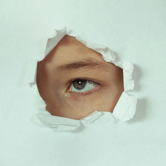 a person in a hole looking straight up