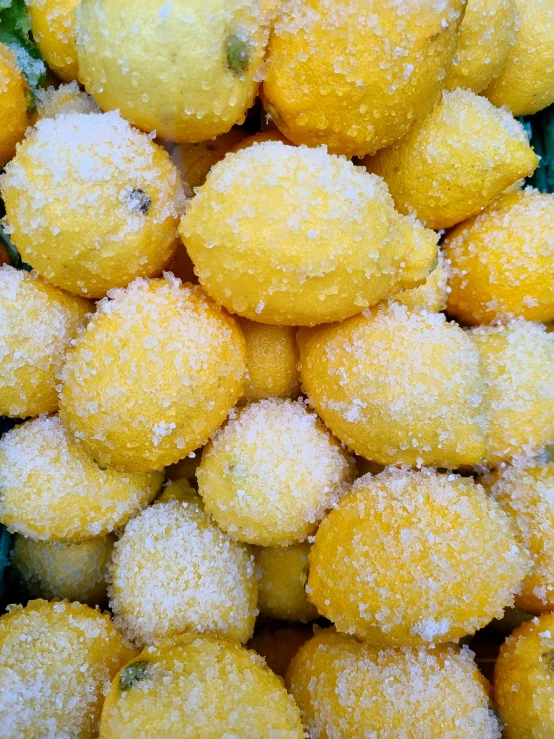 an up close po of some small yellow fruit