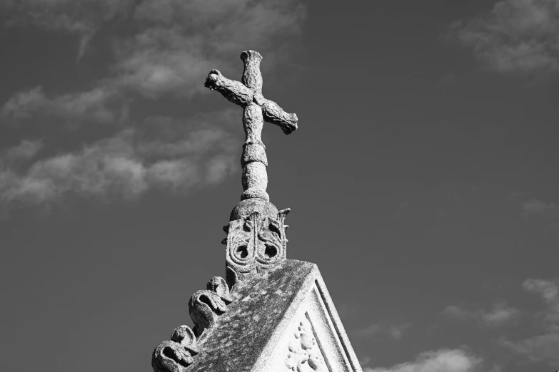 a cross that is on top of a building