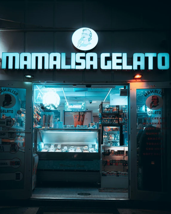 the exterior of a deli and restaurant at night