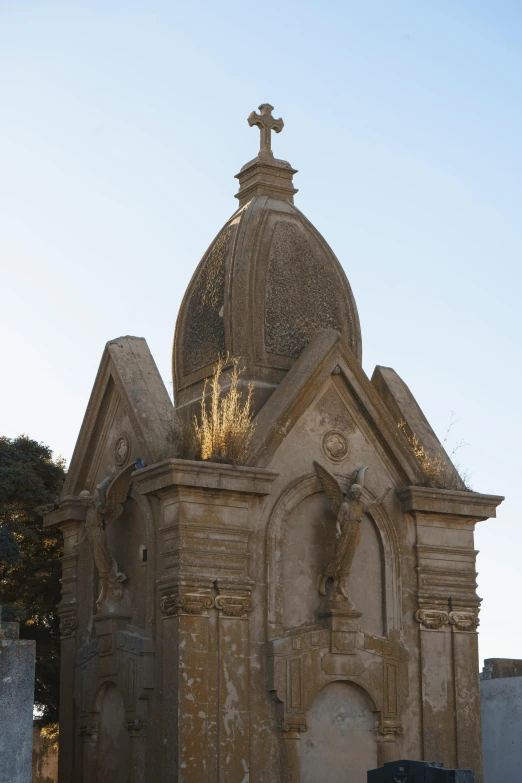 the ancient cathedral has crosses at the top