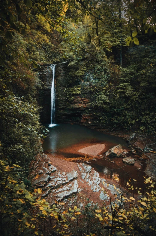 a stream that has some water going over it