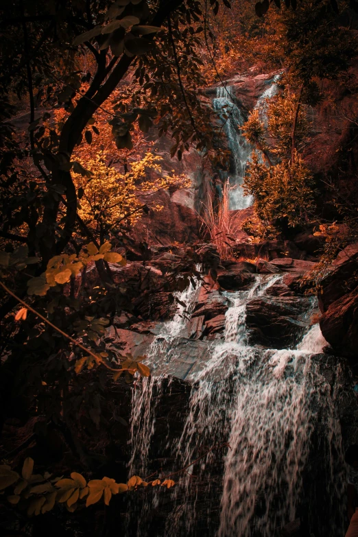 there is a large waterfall that is coming out of the ground