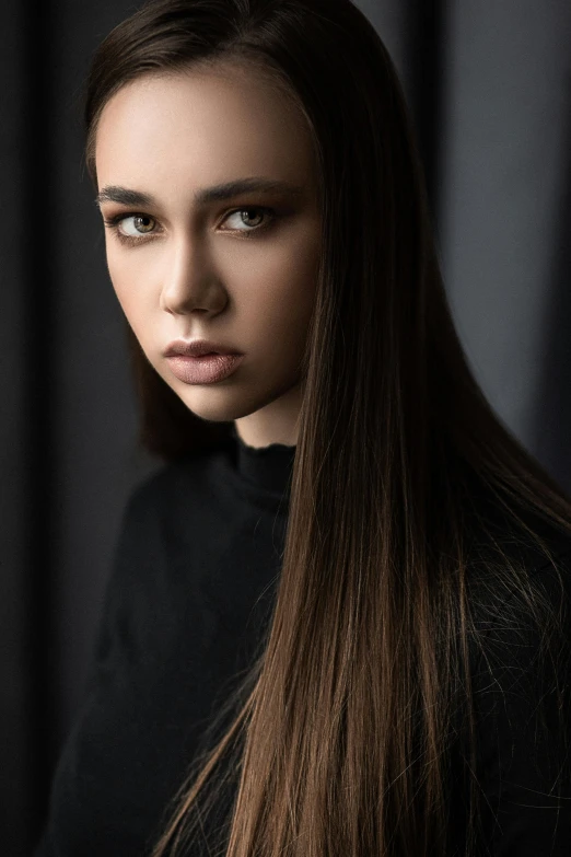 a close up of a woman with long hair