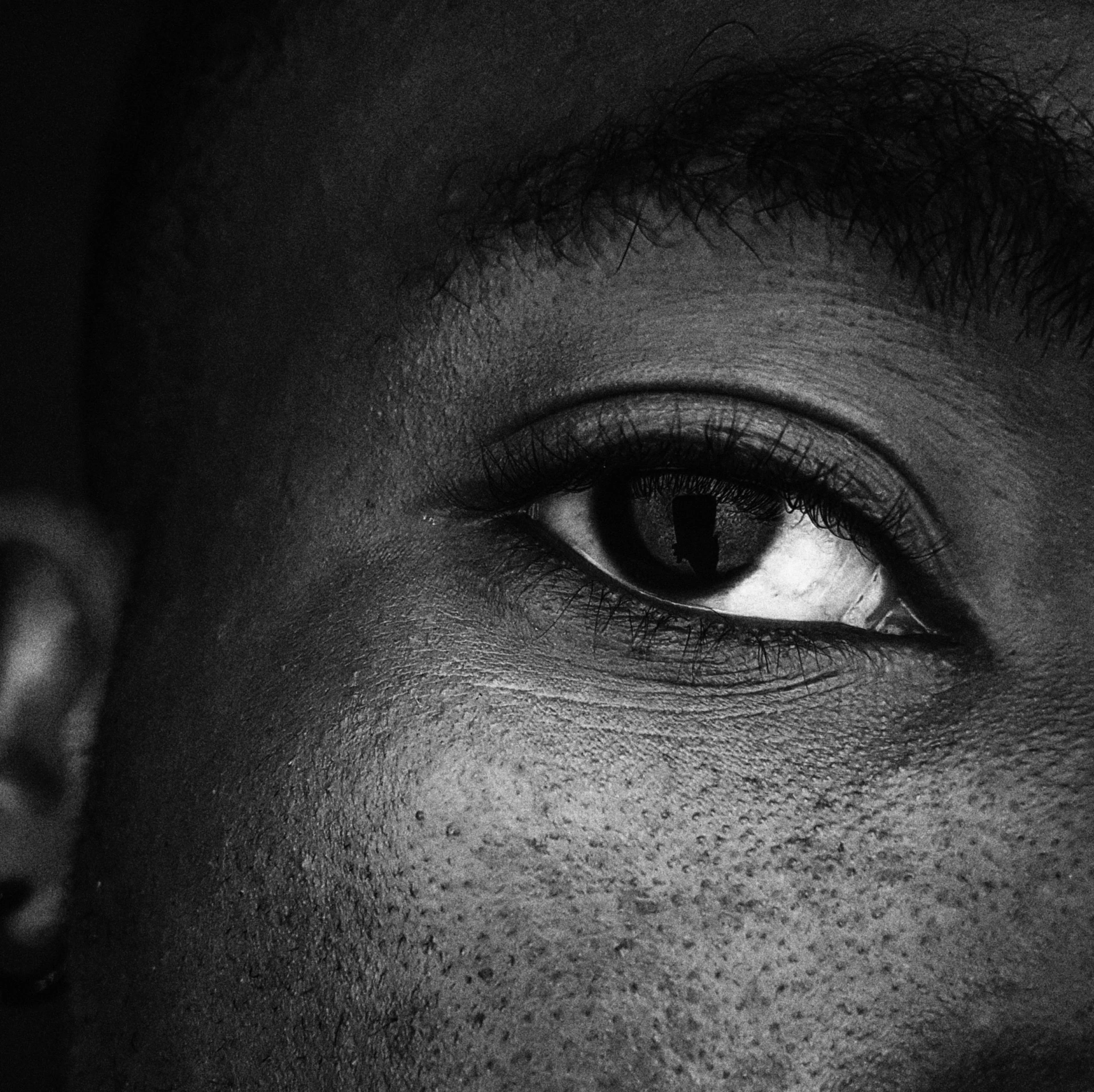 a black and white image of the human eyes