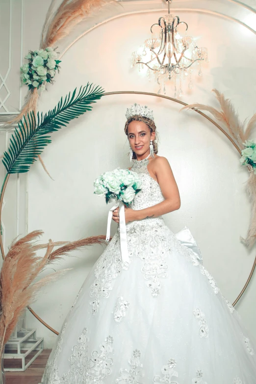 there is a woman dressed in wedding dress with a bouquet on her hand