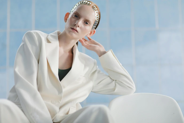 a model poses with her hair comb in her hair