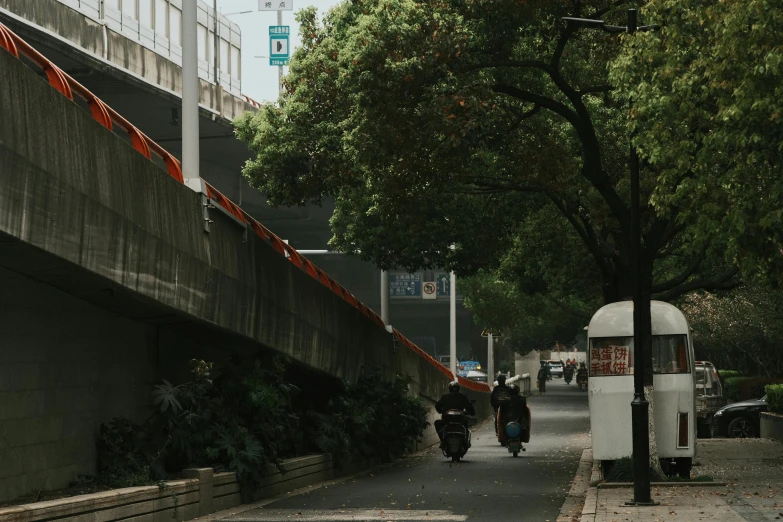 there are two people walking in the street