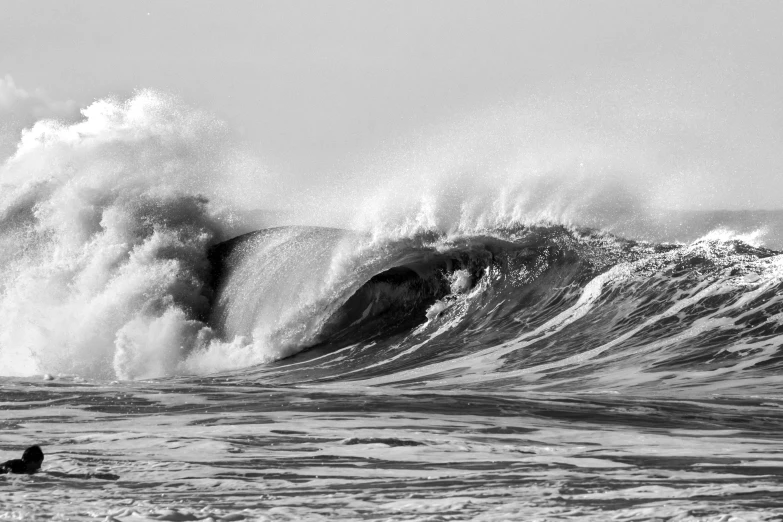 a surfer is riding the giant waves in the ocean